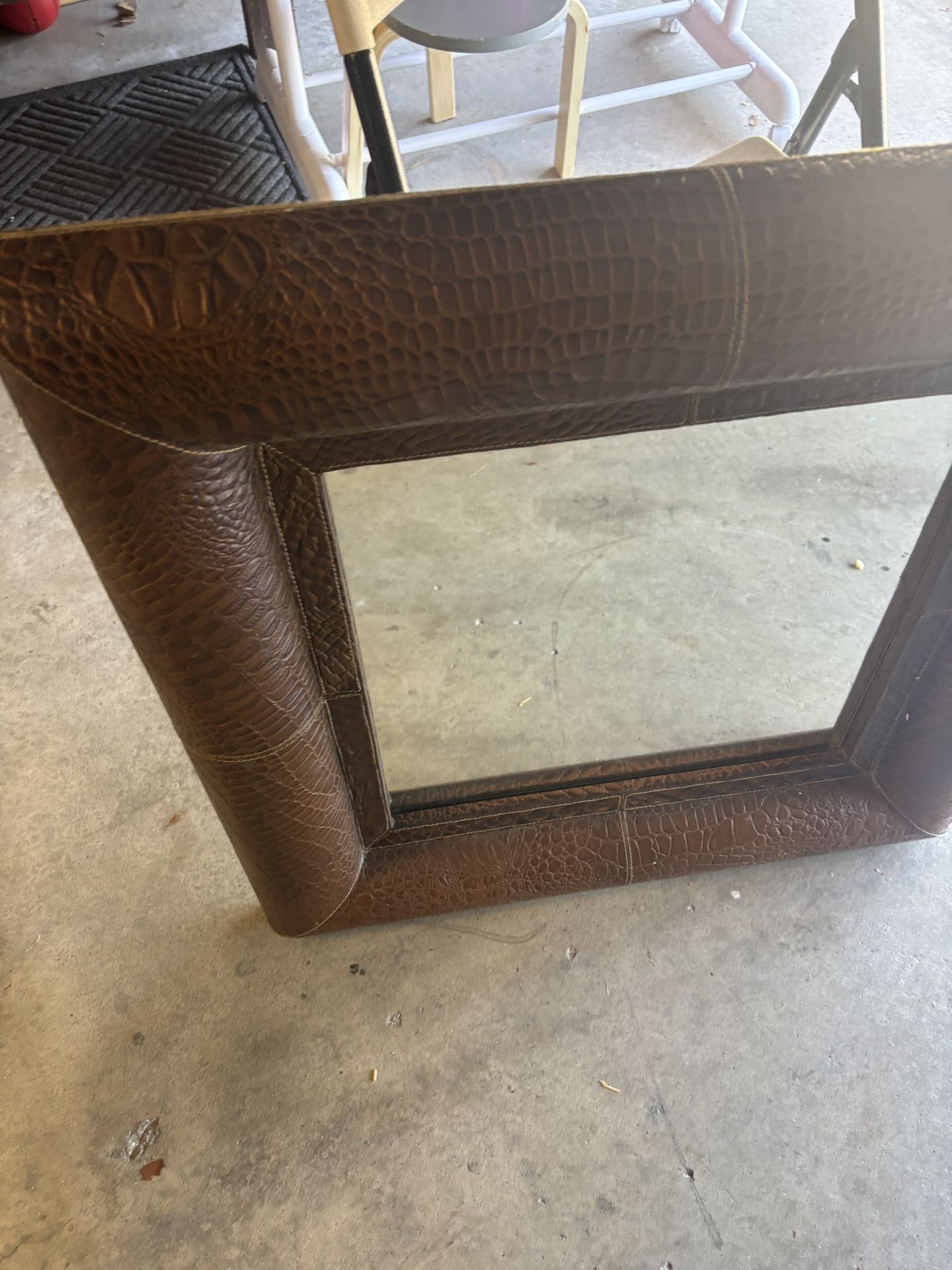 Brown leather Look mirror Durable And heavy Perfect For An Entry Way Or Wherever You like great condition 50$ OBO