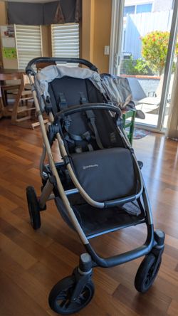 UPPAbaby Vista V2 Stroller, Bassinet, Bassinet Stand, Laundry Bag, and 2nd seat accessories.