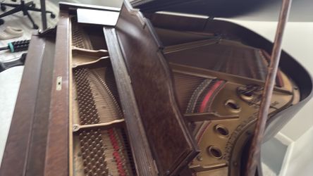 Beautiful wooden baby grand piano free