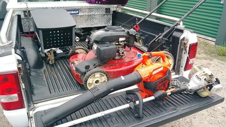 Echo weed eater Echo blower and a tory self-propelled lawn mower all in good condition
