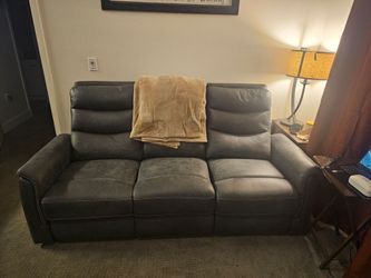 Gray Leather Reclining Sofa