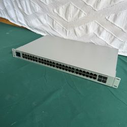 Ubiquiti UniFi Network USW - 48 POE  48 Port PoE no power cord WORKS READ DESCRIPTION  Was recently removed from a real estate office that moved. Work