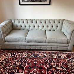 Chesterfield sofa with pull out bed.