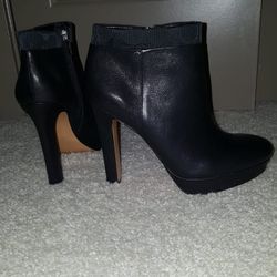 Coach high heel boots. Never worn