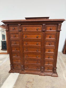 Tall Carved Chest, 18 Drawers