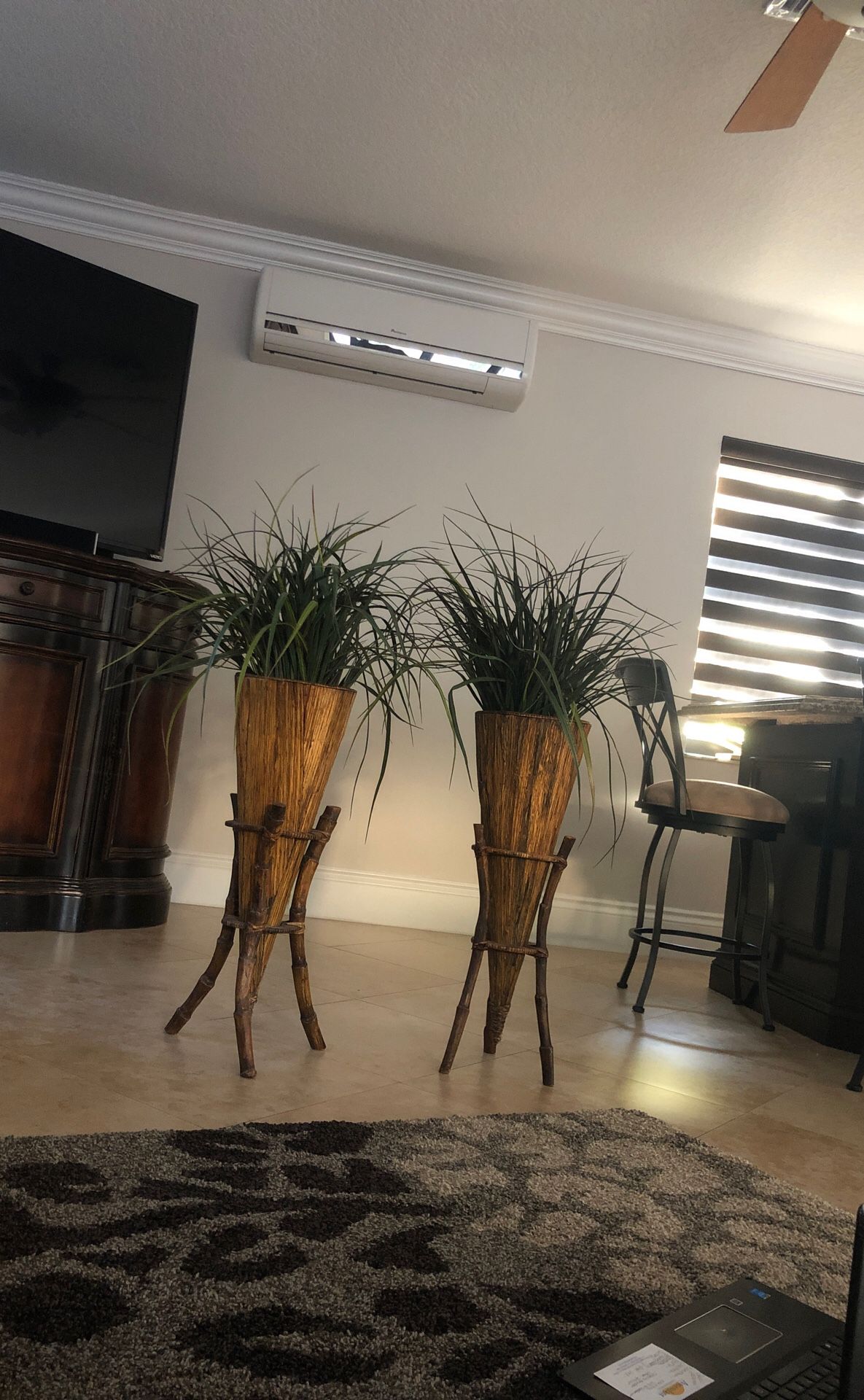 Bamboo stand with plant