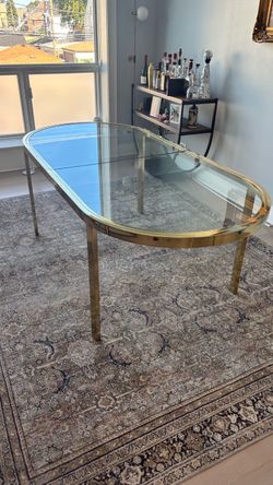 Oval Glass Top Dining Table with Brass Frame