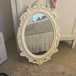 Kirkland’s Ornate Oval Floral Mirror 