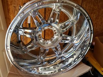 20×12 Chevrolet wheels two months old wanting to trade for 20×10 6 lug wheels or$800