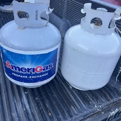 Two empty propane tanks