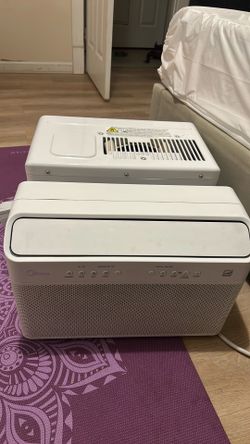 Window A/C unit .