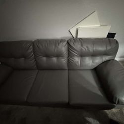 Grey Leather Couch $100/Obo