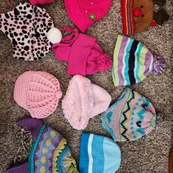 An assortment of little kid hats