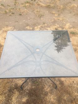 2 foot by 3 foot Patio table with tempered glass