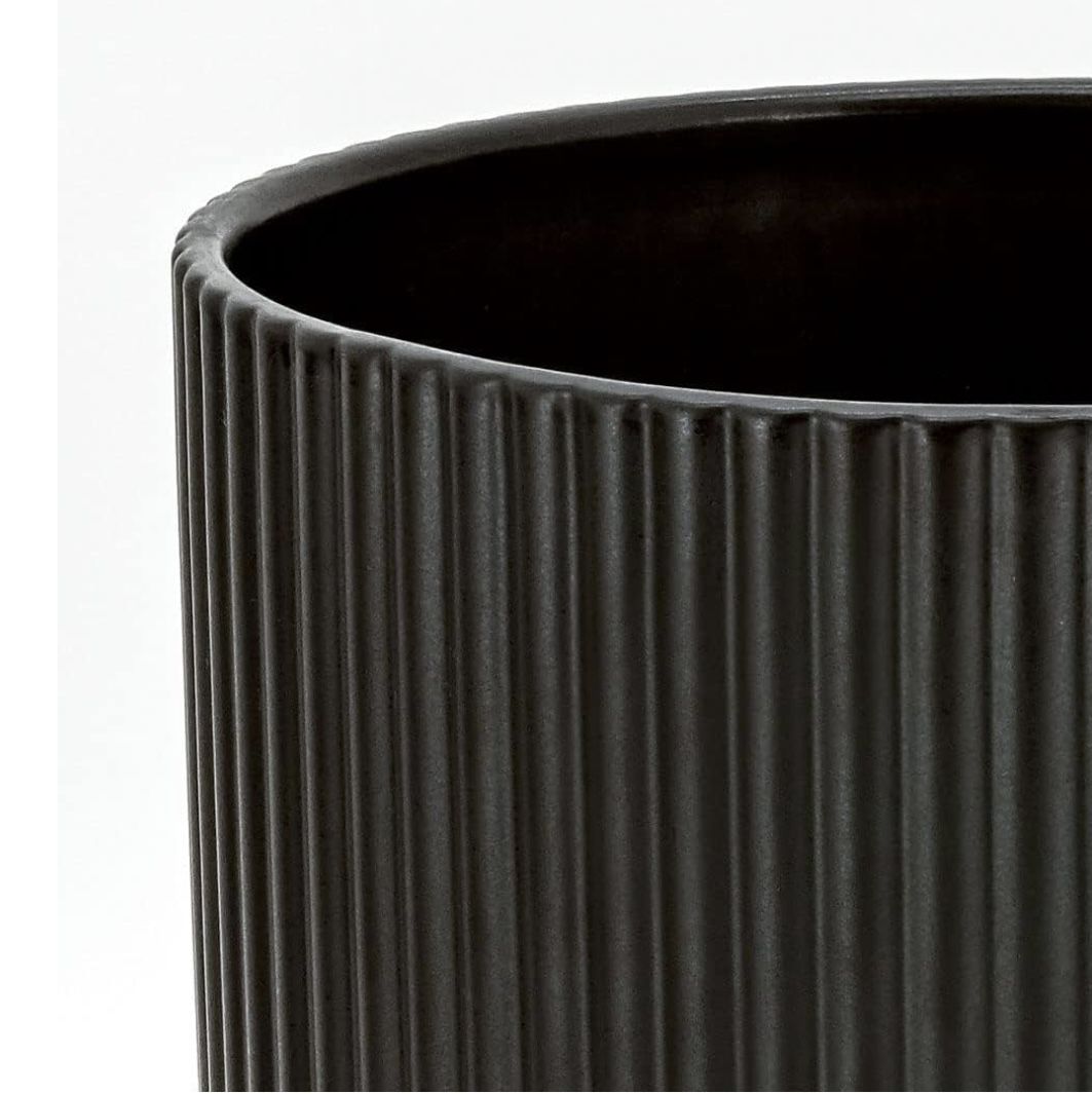 Ceramic Black Planter with 10-inch diameter. Sleek and modern fluted appearance.