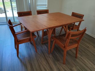 Table And Five Chairs