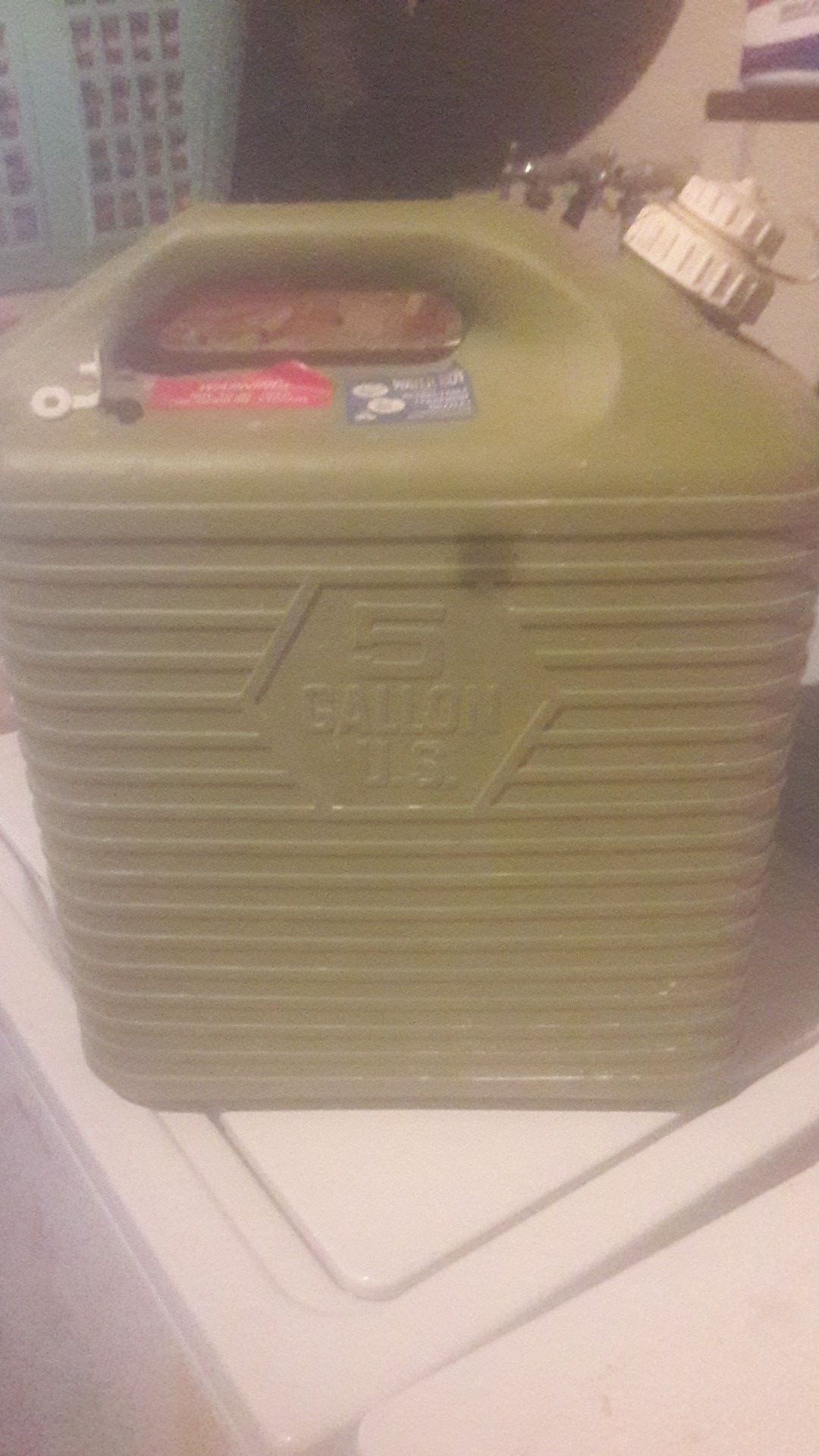 5 gallon water jug with pull out spout.