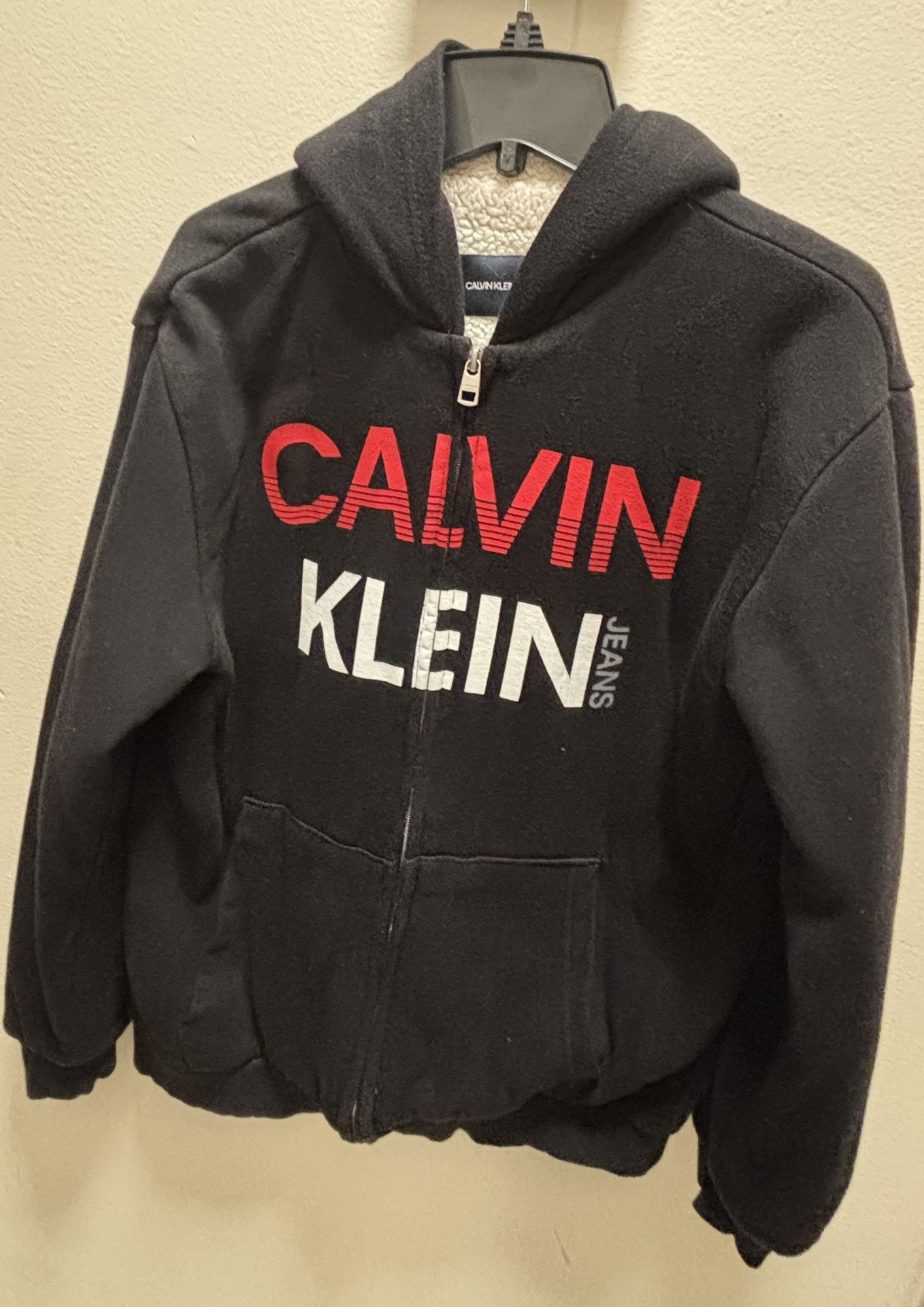 Calvin Klein fleece zip-up hoodie with a logo on the chest