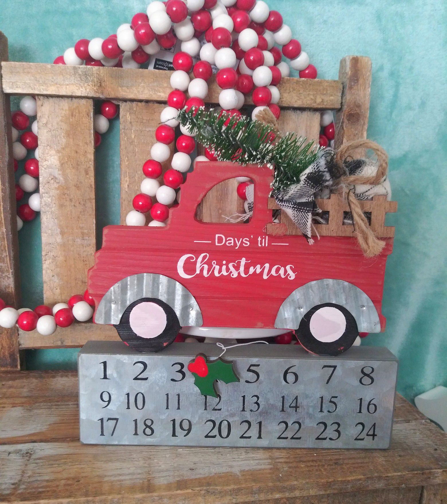 Famous red truck Christmas decor. Christmas countdown calendar with red truck and tree in the back. So cute!! Great for farmhouse decor