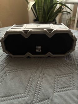 Altec Lansing Super LifeJacket Jolt Waterproof Portable Speaker with Qi Wireless Charging and Customizable Lights.