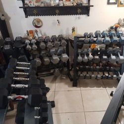 Selling Rubber and steel dumbbells use slightly less than a dollar a pound others a dollar a pound new rubber more than a dollar a pound heavy dumbbel
