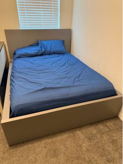 Full-size bed with mattress