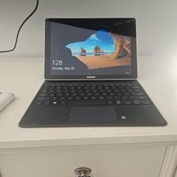 Samsung Galaxy Book, a 2-in-1 device that functions as both a tablet and a laptop (Read Description Please) $50obo