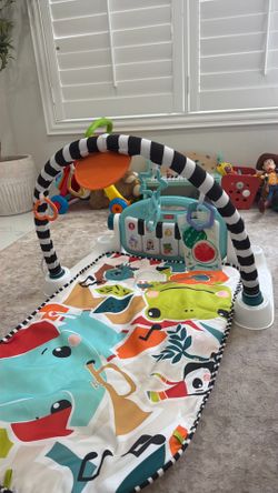 Baby kick and play piano