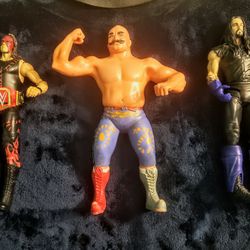 Lot Of 3 WWF, WCW & More WrestlingAction Figures One Is Vintage  Of 1985 Iron Shell & the Undertaker With Championship Belt & Mankind 