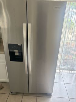 Stainless steel double doors whirlpool refrigerator and stove
