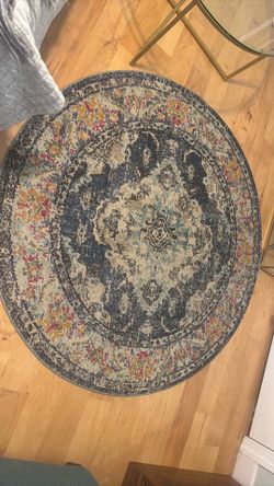 Round blue vintage floor rug