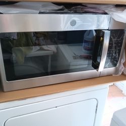 New GE 30 in Stainless Steel Over Of Range Microwave 