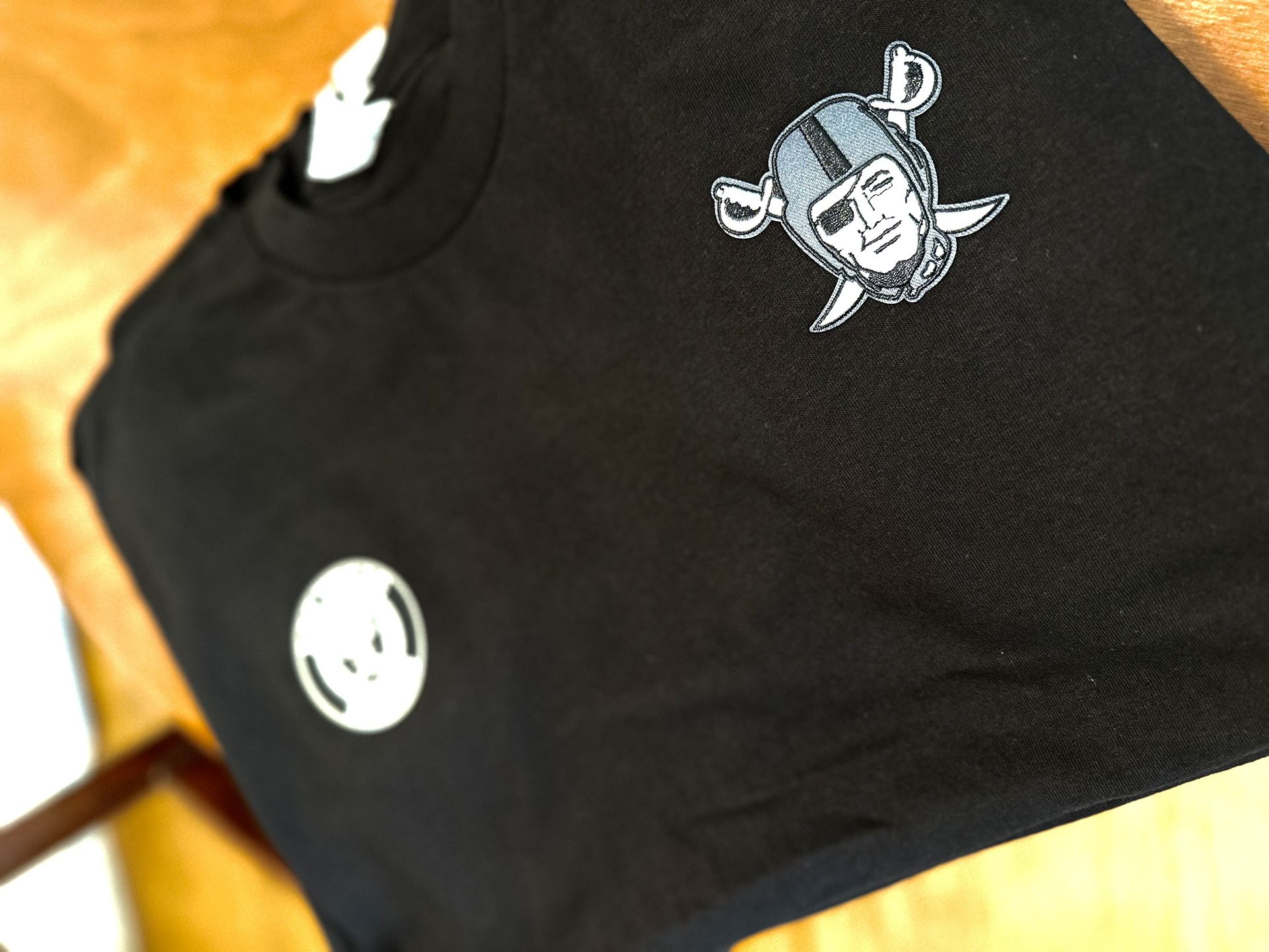 raider shirts XL and L