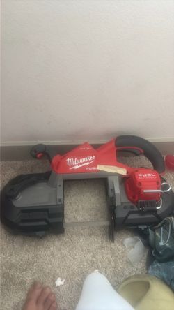 Deep cut dual trigger band saw
