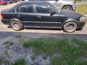 Used black Honda Civic 185,000 milles