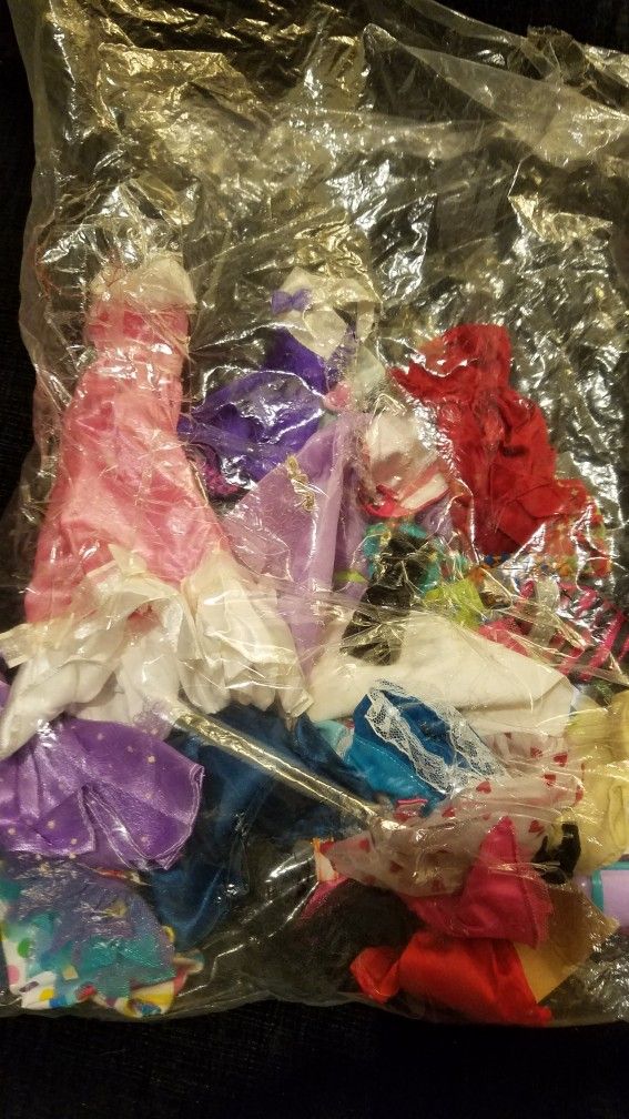 Bag Of Barbie clothes 