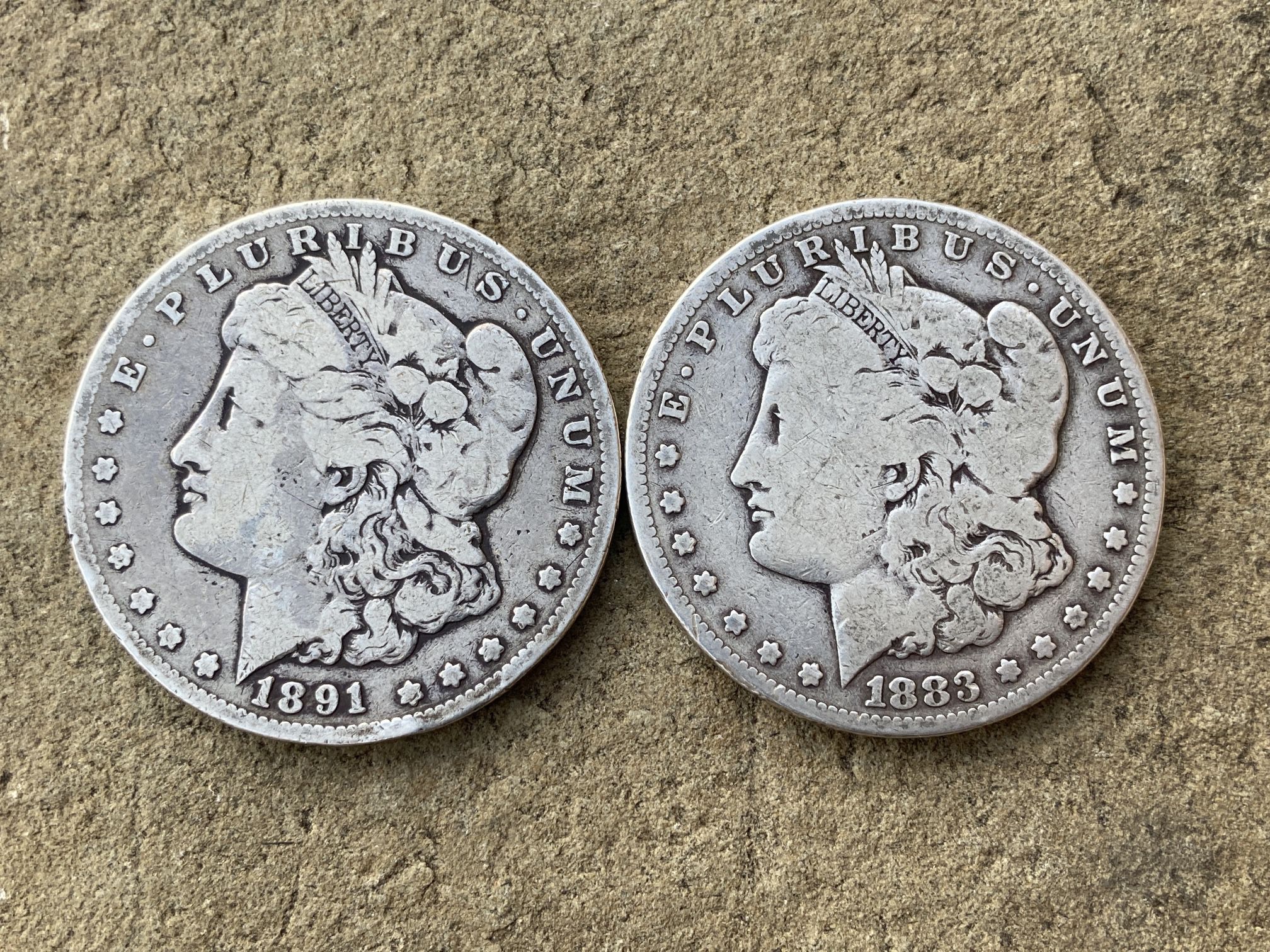 Morgan silver dollars (x2)(both Carson City)