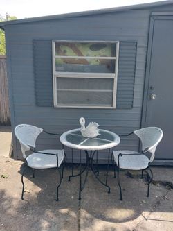 3 piece outdoor wicker/ metal/ glass, vintage dining table with 2 chairs.