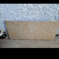 beautiful marble countertop? 40" long 18" wide and 3/4" thick wavy edges