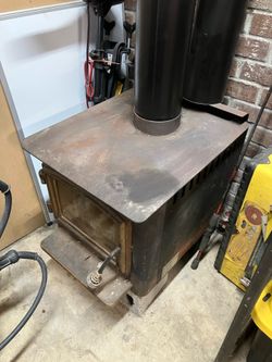 Wood burning stove and piping