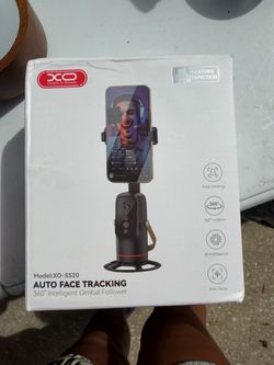 Auto face tracking stick
