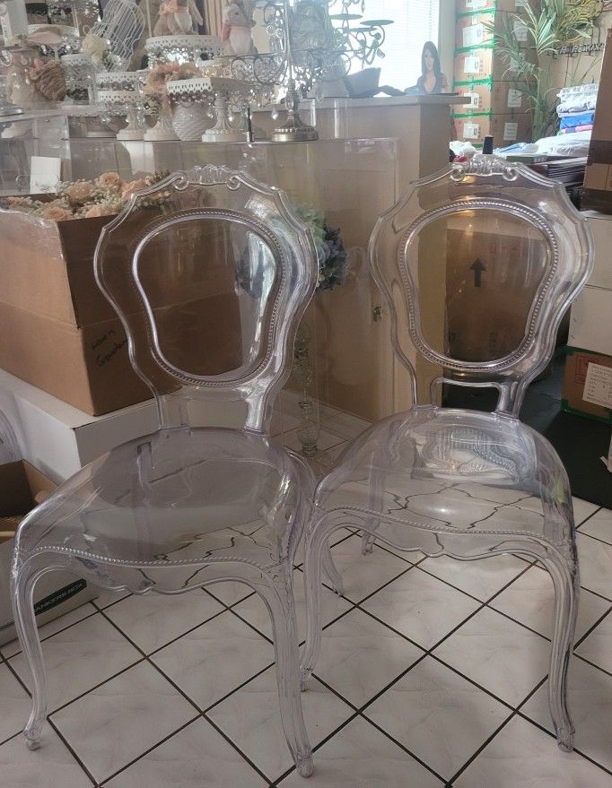 Clear Acrylic Ghost Chairs 