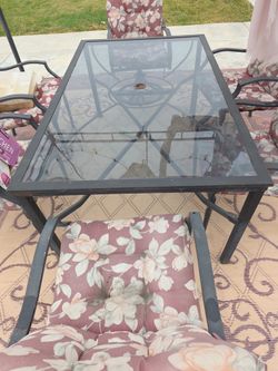 Glass and Wrought Iron Patio Table With 6 Chairs 