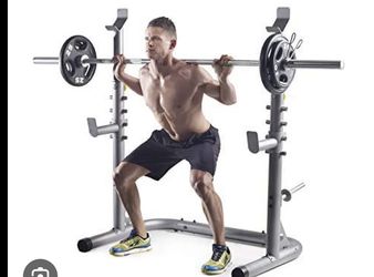 This is a Weider Olympic workout rack, designed to hold barbells for squats and bench presses. Olympic barbell included