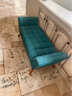 Teal blue lounge chair