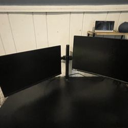 Dual Monitors With A Mount 