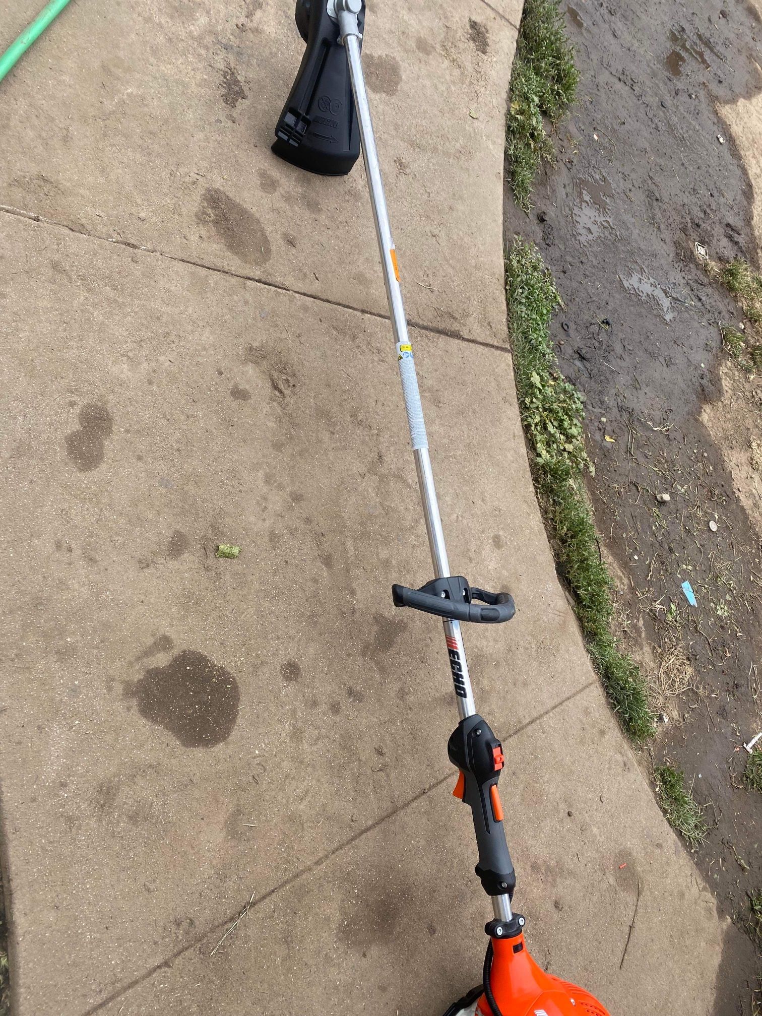Echo 21.2cc High Torque String Trimmer. SRM-2320T ECHO 21.2 cc Gas 2-Stroke Straight Shaft String Trimmer