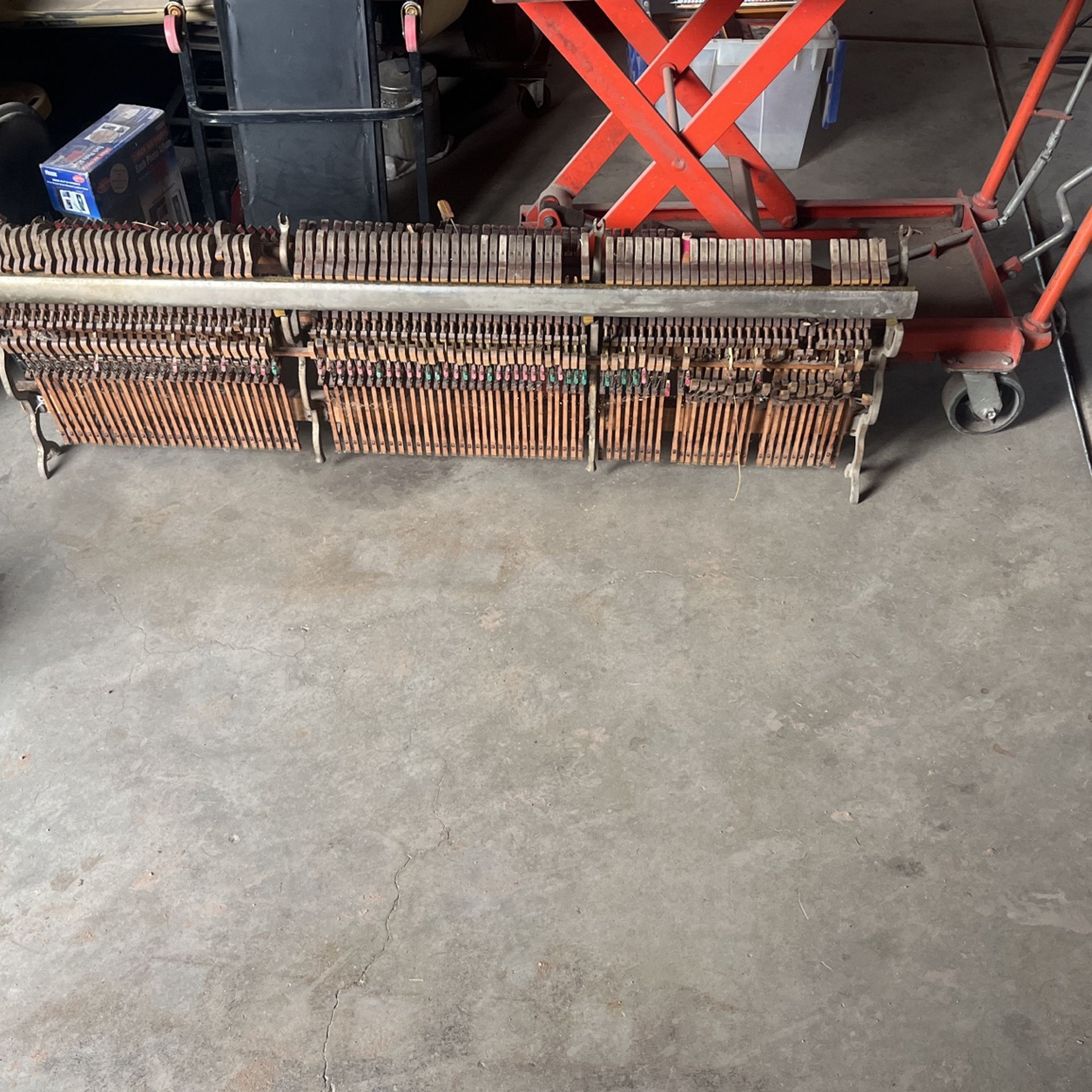 The hammer set up for an old vintage piano to hit the strings