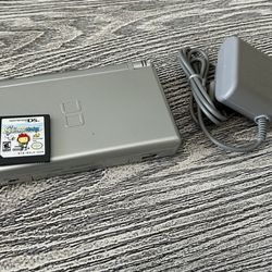 Silver Nintendo DS Lite with ScribbleNauts game, complete with charger. $65