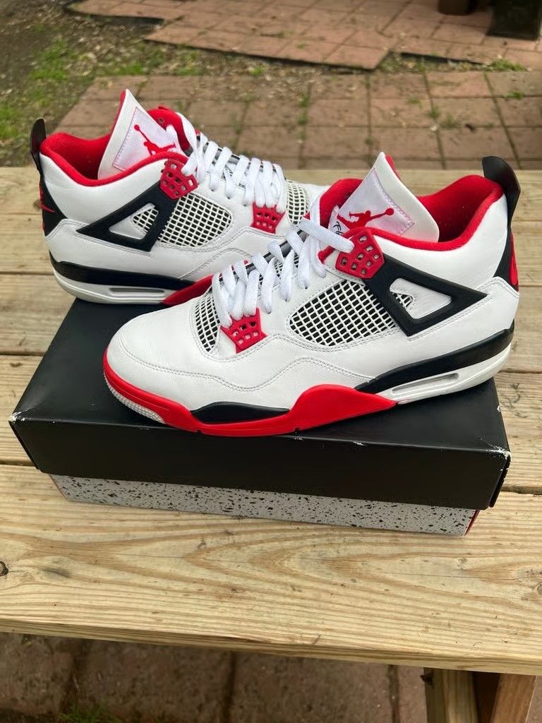 The men's fiery red sneakers and sports shoes are brand new